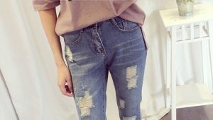 Hoe maak je trendy gaten en slijtage op jeans?