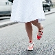 Skirt with sneakers - fashionable bows