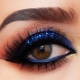 Smokey eye makeup with blue shadows