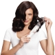 Hair dryer with rotating brush